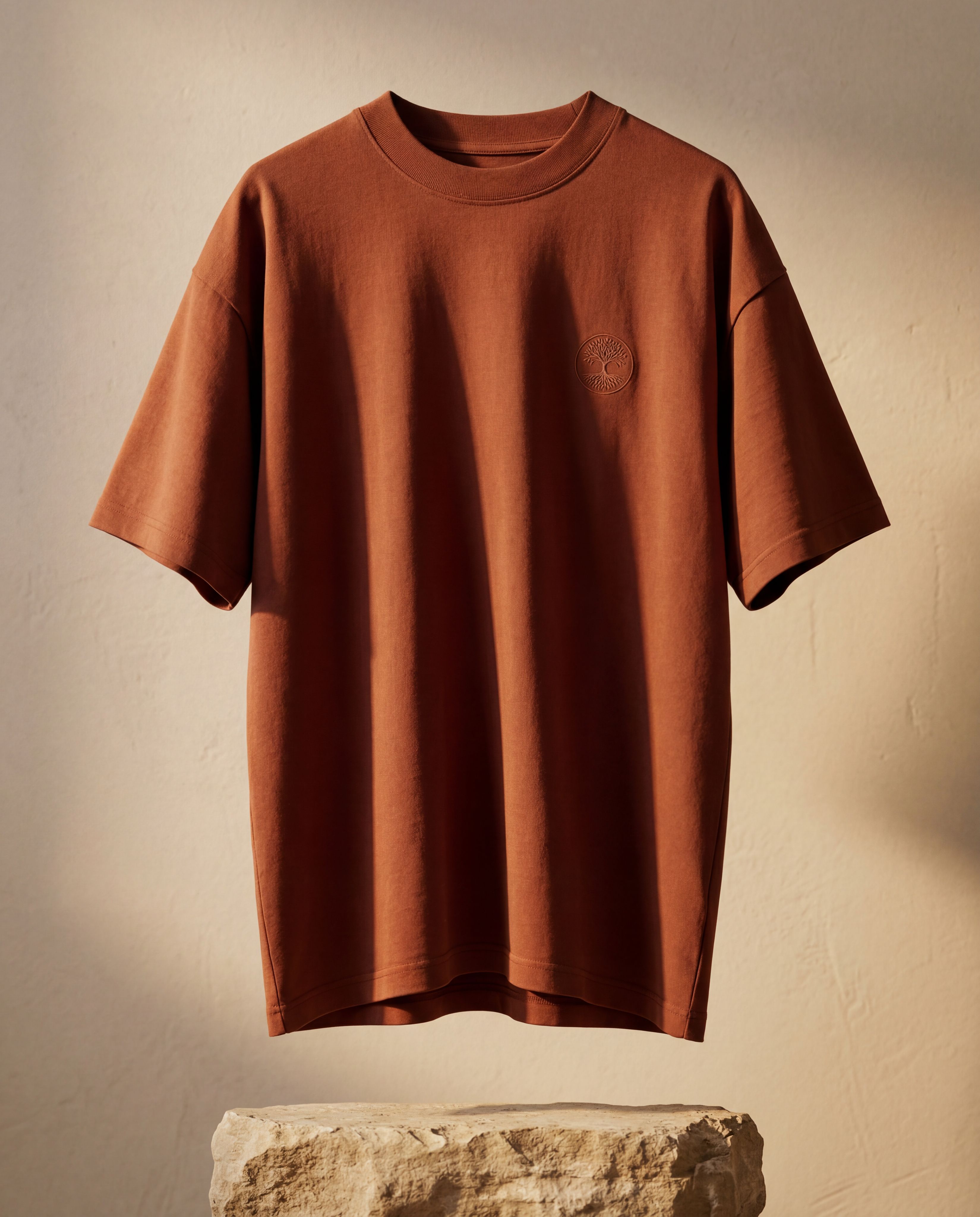 Name Roots tee — terracotta, front